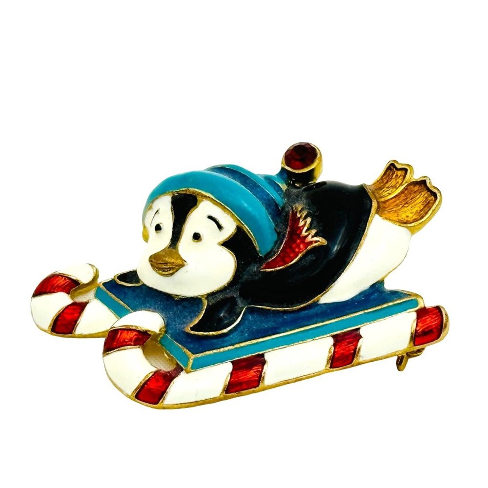 Vintage Holiday Sledding Penguin Brooch by Christopher Radko